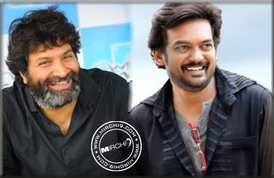 Puri competes with Trivikram ?