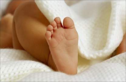 Surrogacy baby feet