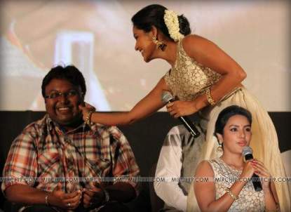 Priya-Anand-pinch-cheeks-photo