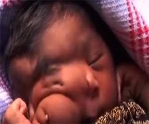 baby with elephant trunk