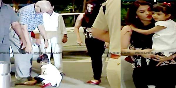 aaradhya bachchan touches her grand father feet
