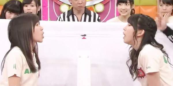 japanese girls game with dead cockroach