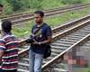 Husband pushes pregnant wife out of moving train