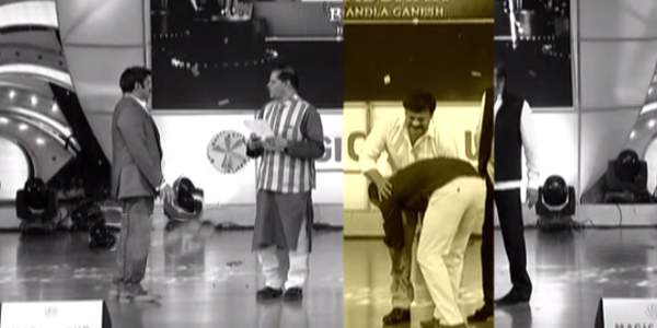 bandla ganesh touching chiranjeevi feet