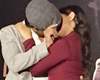 Actor kisses on stage