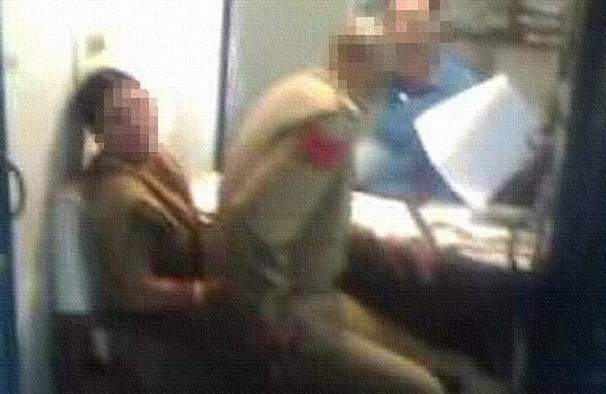 police-sits-on-women-lap