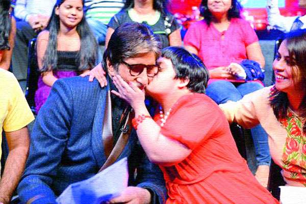 Downs Syndrome girl rhea plants kiss on Amitabh Bachchan cheek