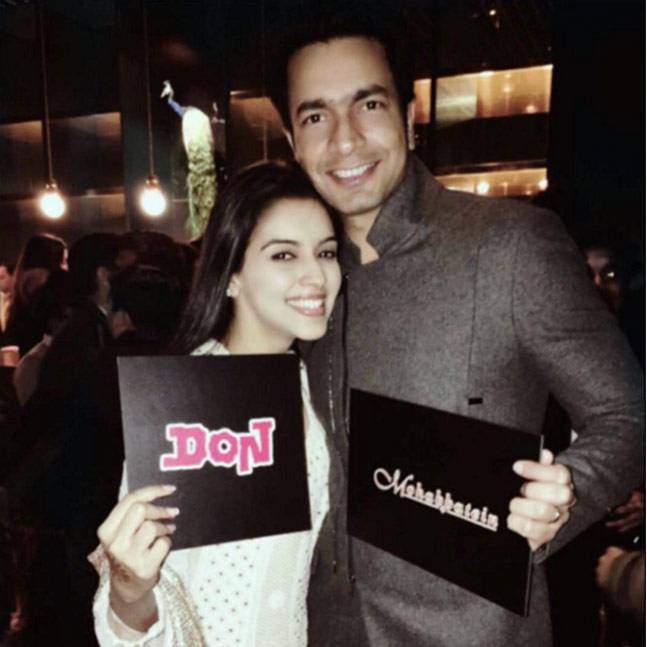 Asin holding photo