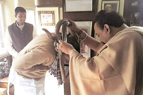 bihar minister ashok kumar choudary blesses withSnakes