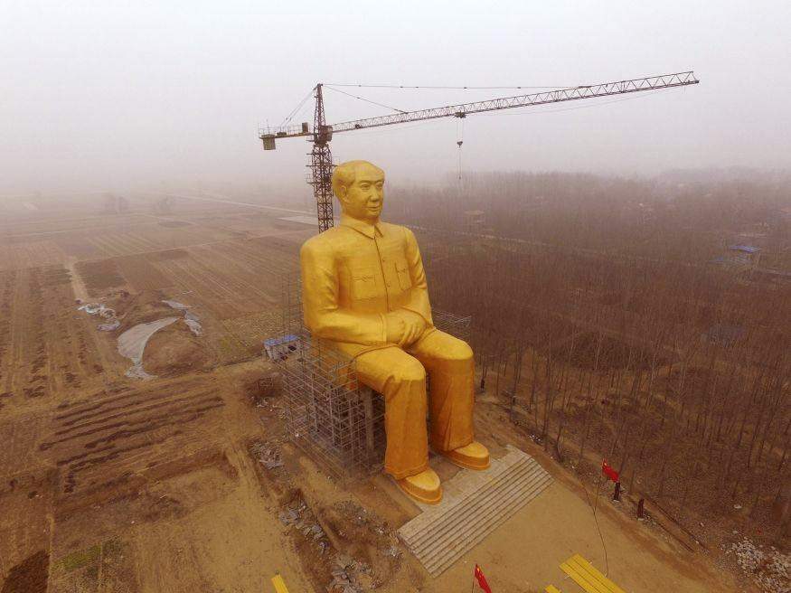 gold statue demolished china
