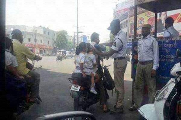 Hyderabad Traffic Police caught feeding glucose to children