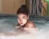 Model in steam bath says "Come join me"