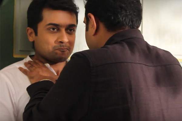 director trying to show Samantha how to kiss suriya 