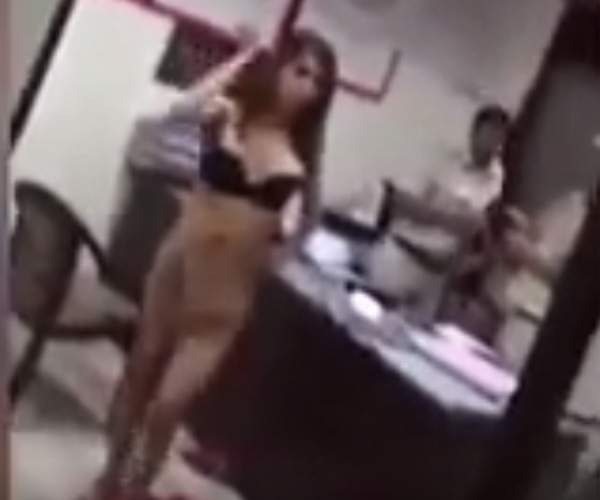 woman strips in police station