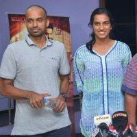 PV Sindhu Watches Janatha Garage Movie Photos, Pullela Gopichand Watches Janatha Garage Movie Stills