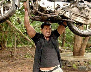 John Abraham, John Abraham Lifts Mercedes Benz Car, John Abraham Holds Mercedes Benz Car, John Abraham Carries Mercedes Benz Car