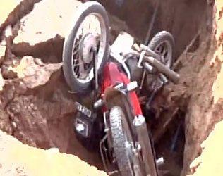 Bike Accidents Open Potholes