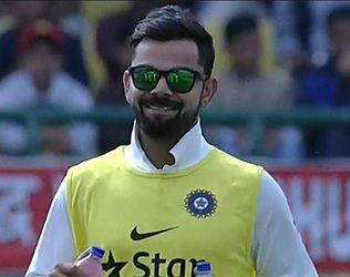 vIRAT Kohli comes in as a water boy