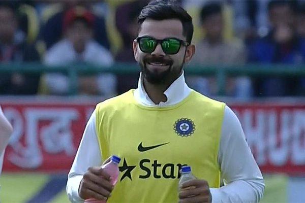 vIRAT Kohli comes in as a water boy