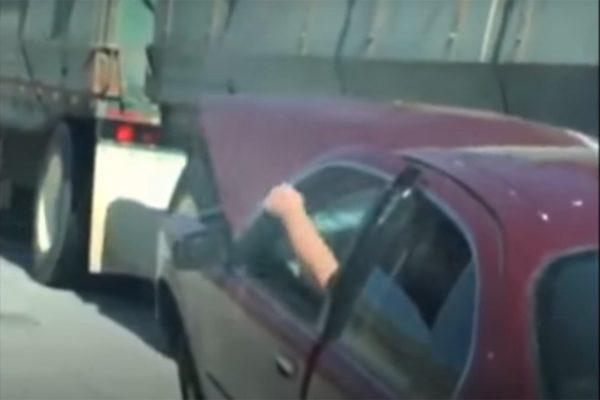 CAR, LODGED UNDER SEMITRUCK, DRAGGED ALONG CAJON PASS