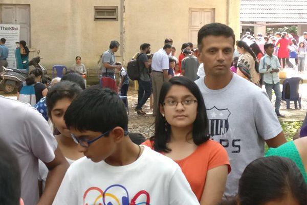 Rahul Dravid in a queue with his kids at a science exhibition.
