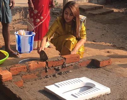 Trisha-Spotted-Raising-a--Toilet