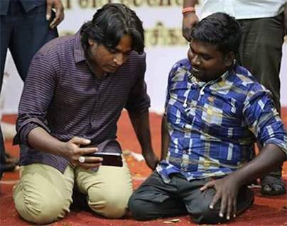 Vijay Sethupathi Sits on the Floor After Suriya Falls on Fan's Feet