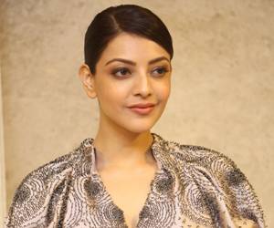 Kajal-Aggarwal-at-MLA-Audio-Launch-Stills-Photos