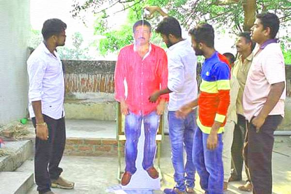 Nagarjuna Akkineni Fans' Innovative Treat to Ram Goapl Varma (RGV)