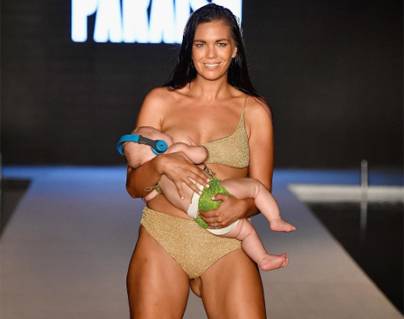 Fashion-Runway-Show-While-Breastfeeding-Her-Baby