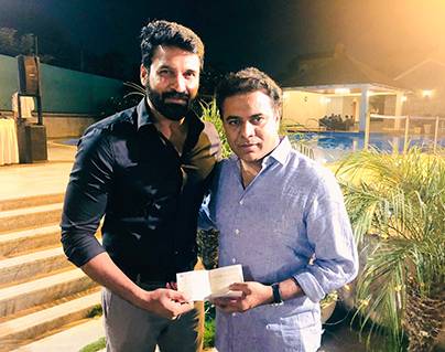 Actor Subba Raju cheque to Minister KTR