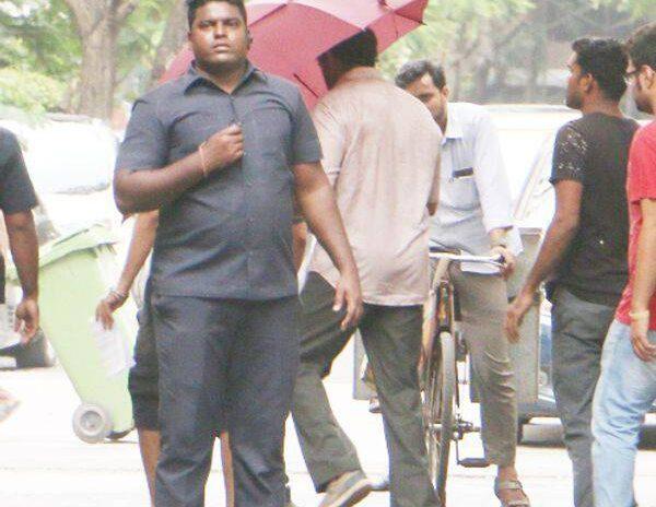 Hrithik Roshan Hiding His Face Under an Umbrella