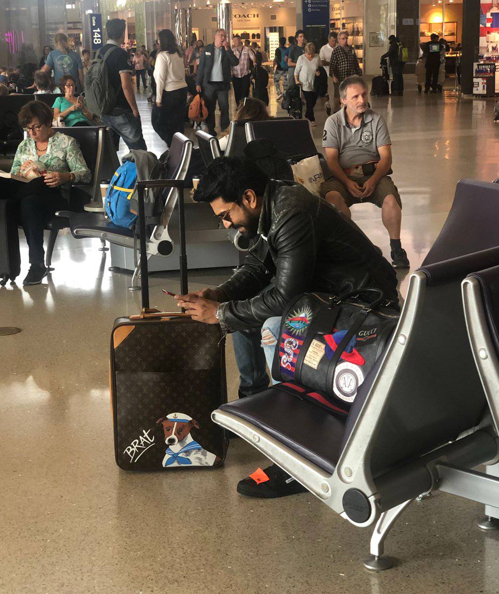 ram charan watching Sye Raa Narasimha Reddy first look