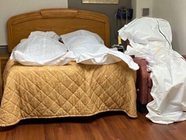 Corpses-Propped-Up-on-Chairs-in-Motor-City,-US