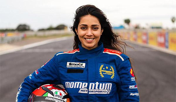 Actress Flaunts Skill With F1 Race Car