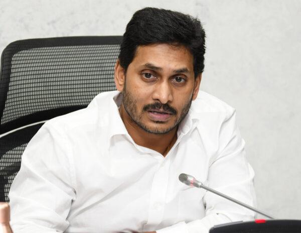 Development in Telangana welfare schemes here and debts