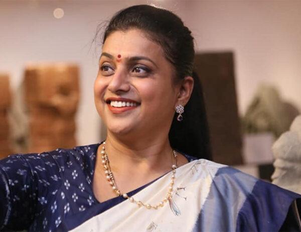 minister Rk Roja replies about ktr comments with smile