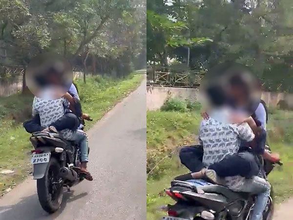 Viral-Video-Vizag-Lovers-Indecent-Stunts-On-Moving-Bike-