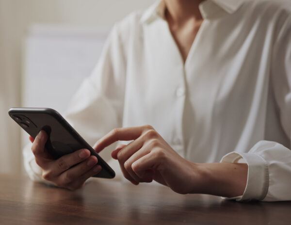 woman-using-smartphone-on-the-table-free-video-