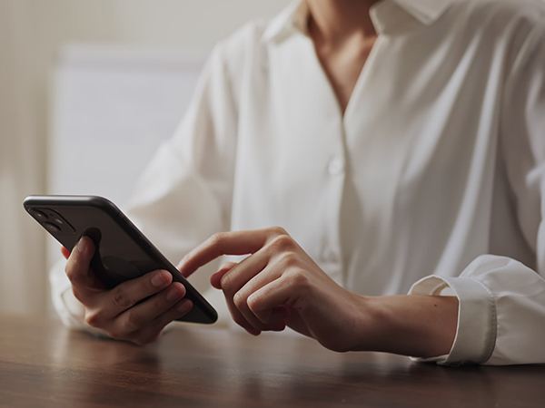woman-using-smartphone-on-the-table-free-video-