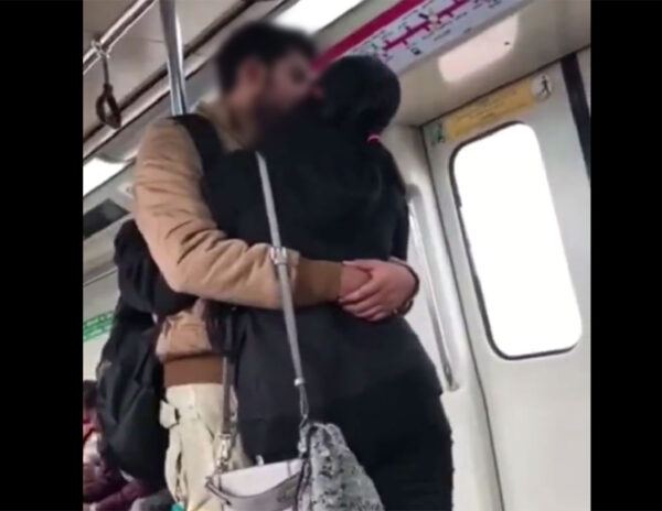 Lovers Kissing on Delhi Metro