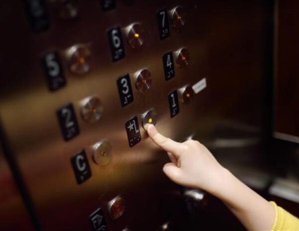 Boy Stuck in Elevator Keeps Cool with Homework