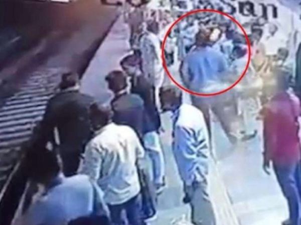People Lynch Man Till Train Runs Over Him