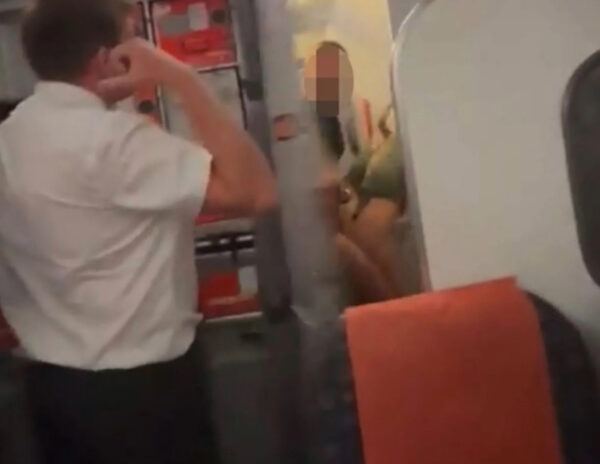 Couple Caught Making Out In Flight