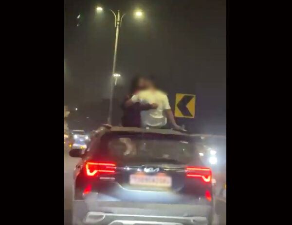 Couple Kissing on Car