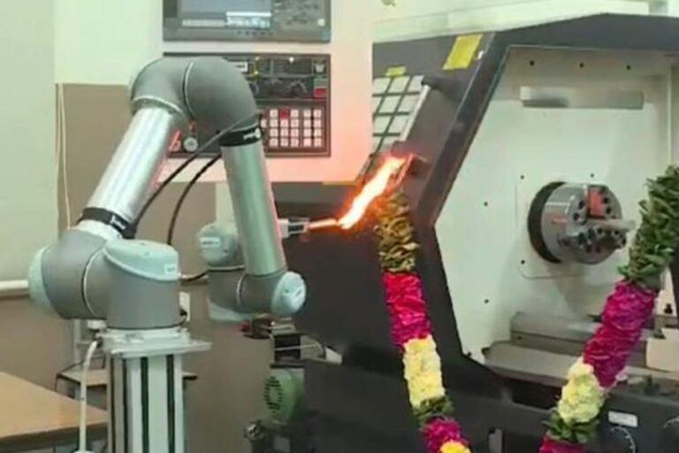 Robot Performs Pooja At College