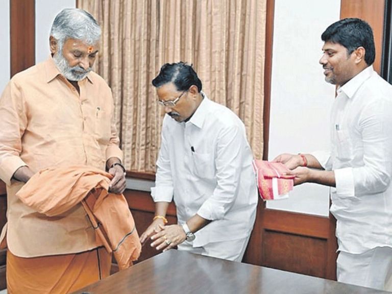 Dalit MLA Touches PeddiReddy Feet
