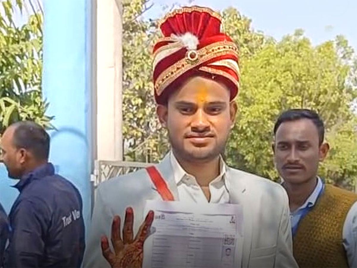 Man Writes Exam Wedding Attire
