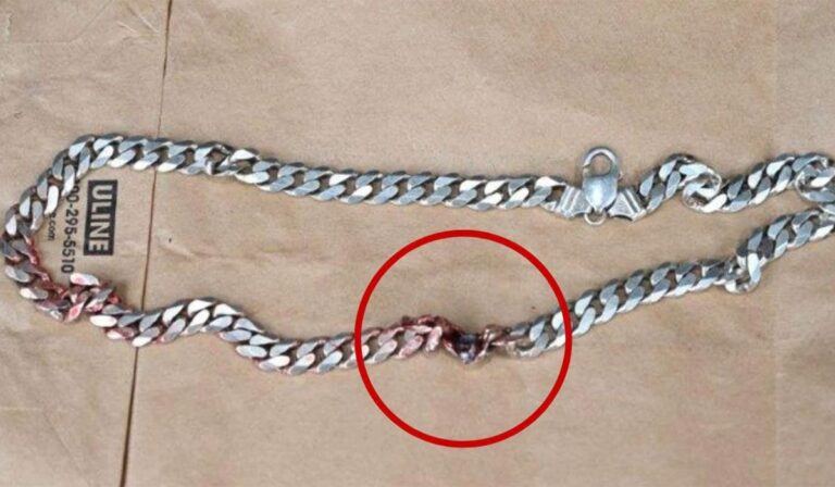 Man Saved By Gun Through Necklace