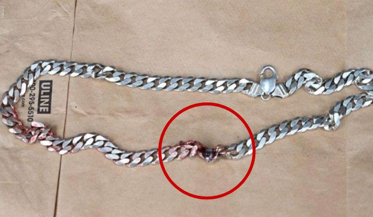Man Saved By Gun Through Necklace